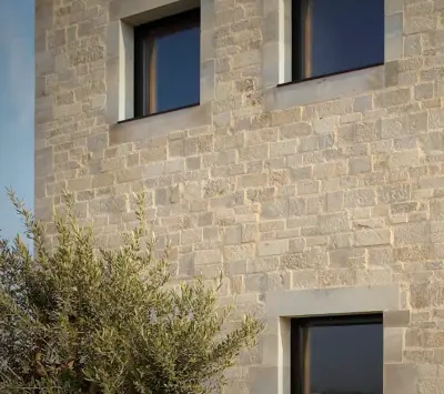 Parement en pierre naturelle d’Auberoche pour façade extérieure – teintes chaudes beiges